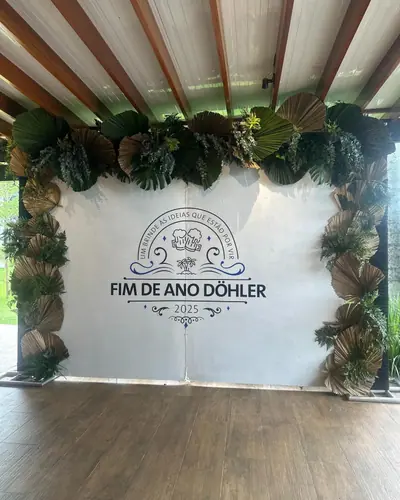 Painel da confraternização de fim de ano da empresa Döhler, atendida pelo buffet